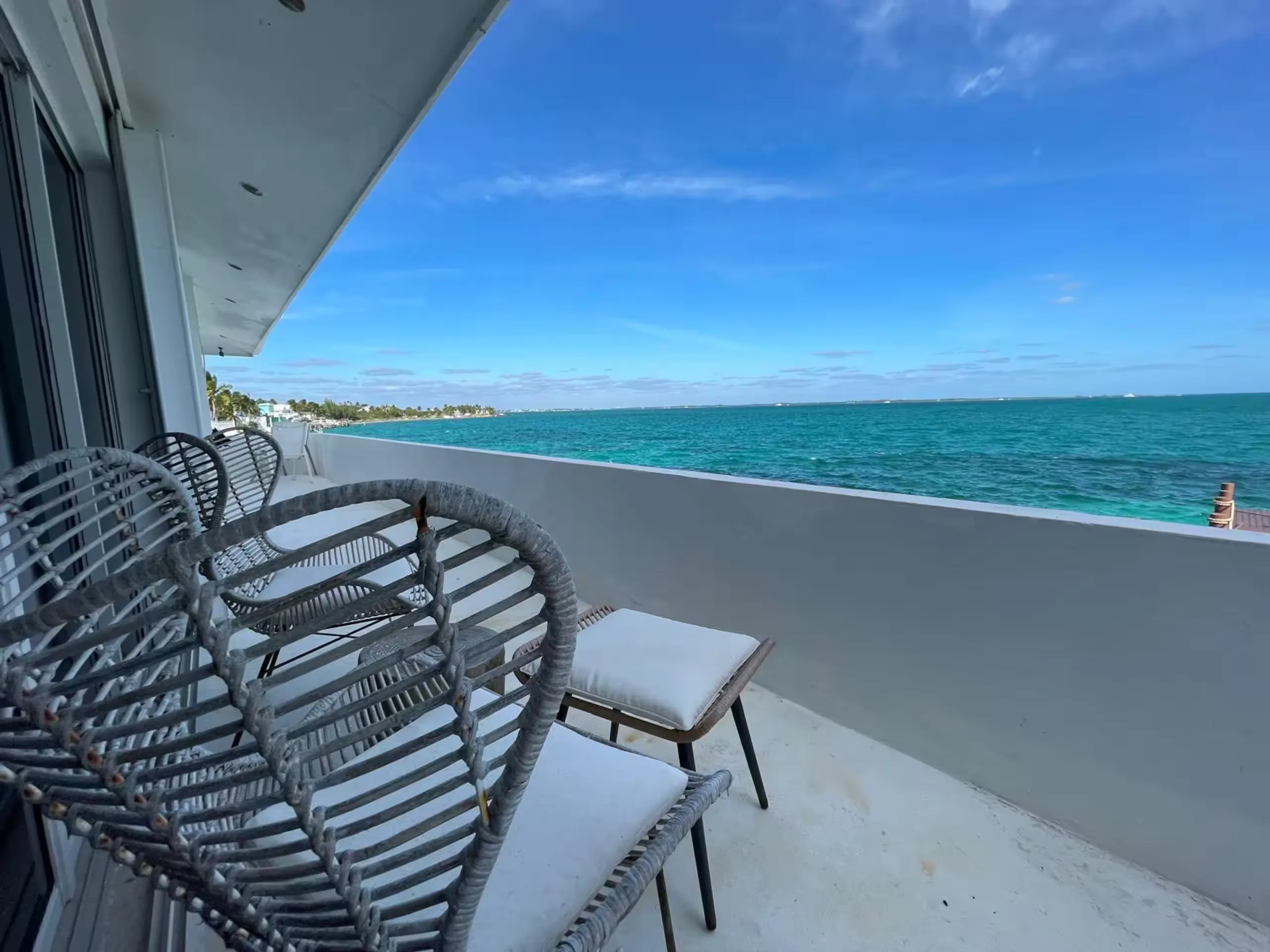 Ocean-view balcony with outdoor seating