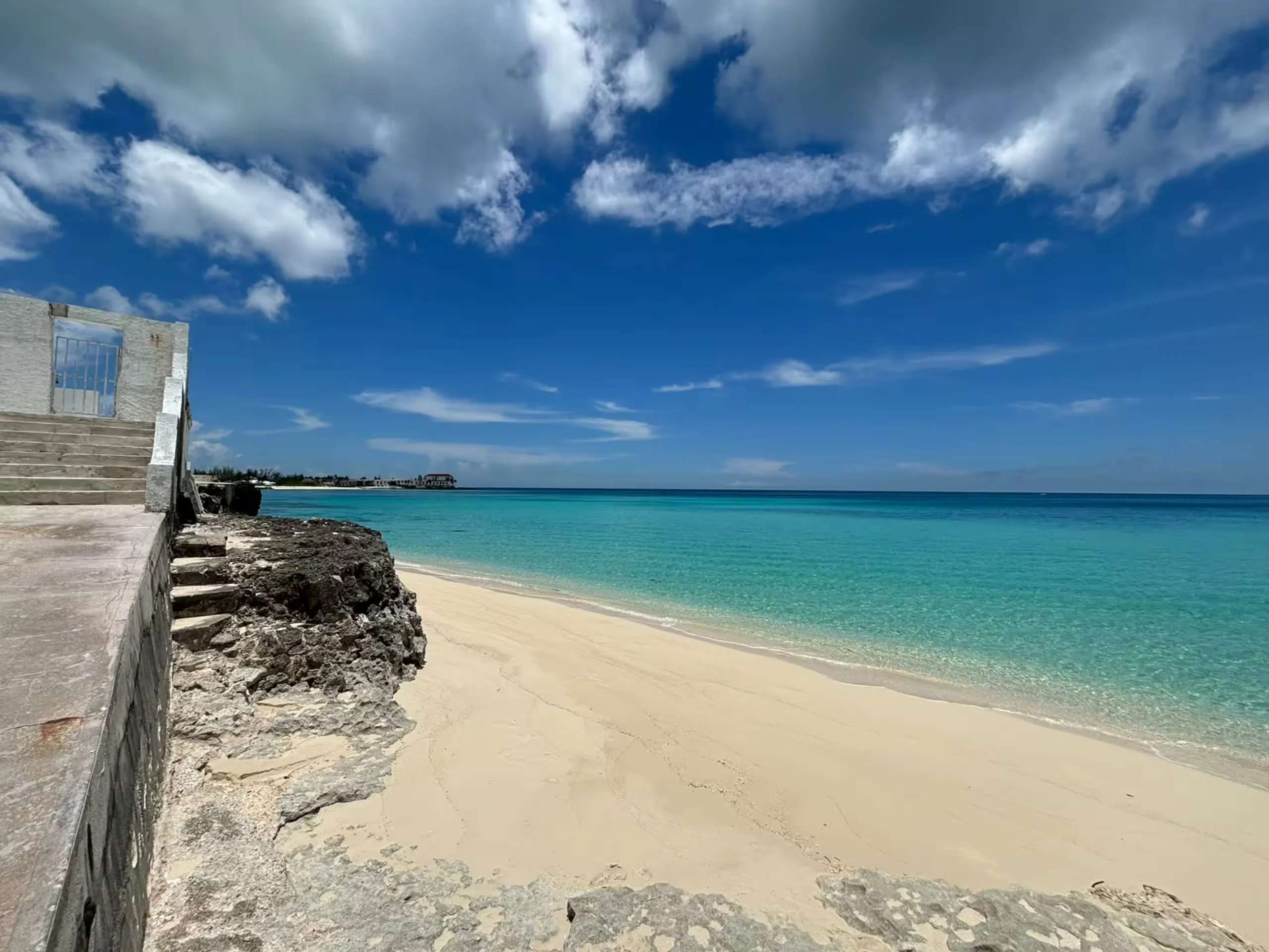 Stairs down to white sand and turquoise Cable Beach water
