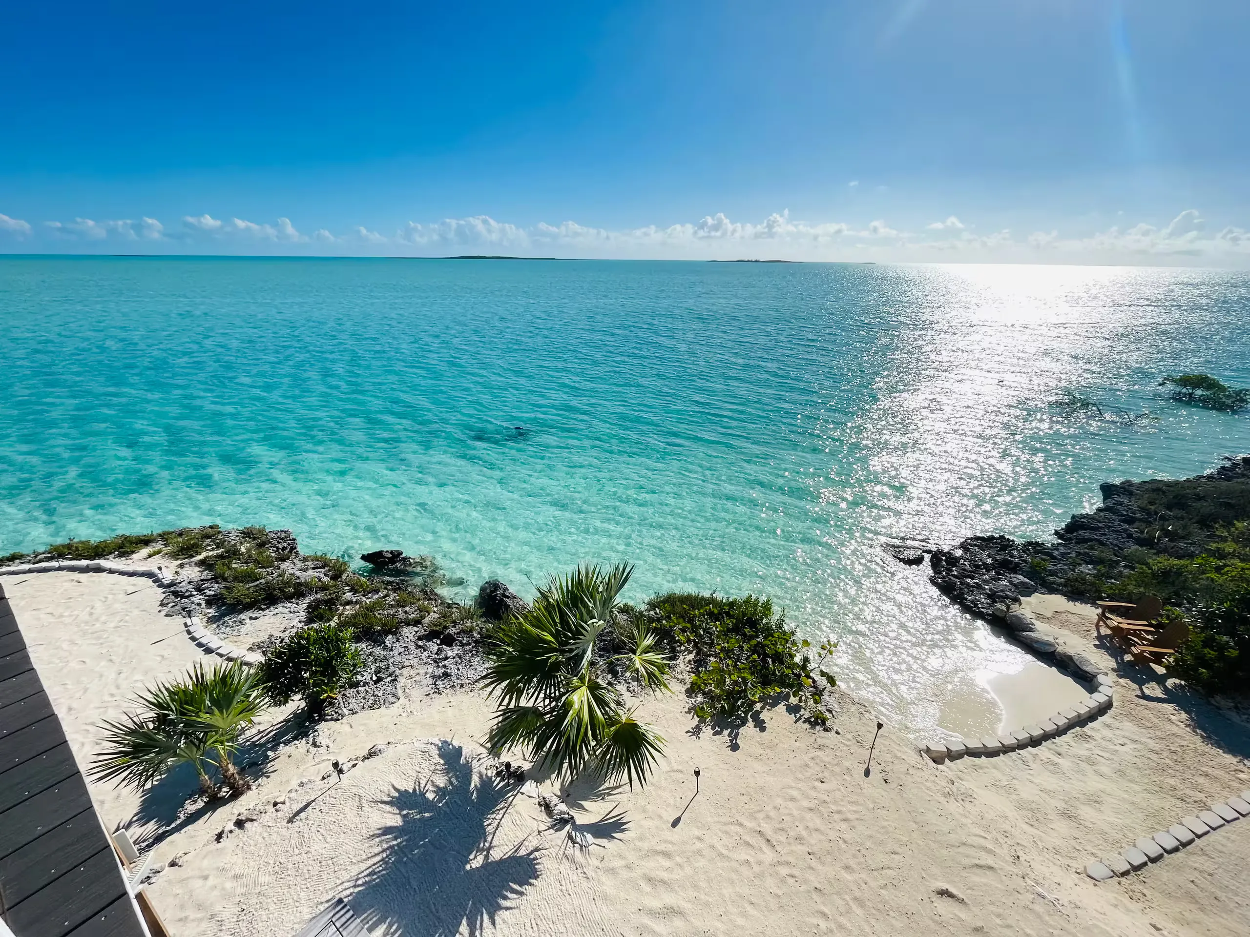 View of the private beach and turquoise water from the deck