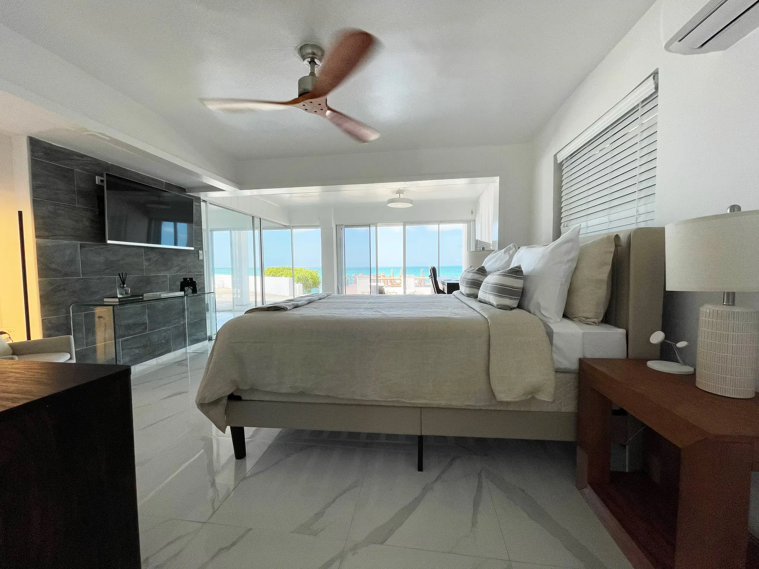 Bedroom with en-suite bathroom and ocean view