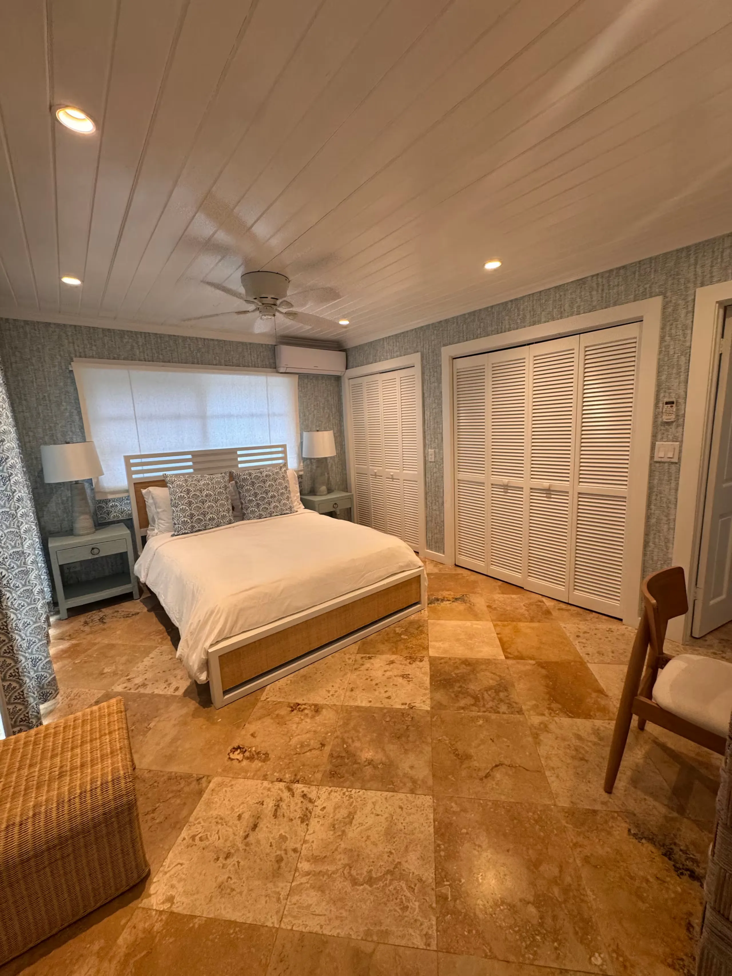 Third bedroom with patterned tile flooring