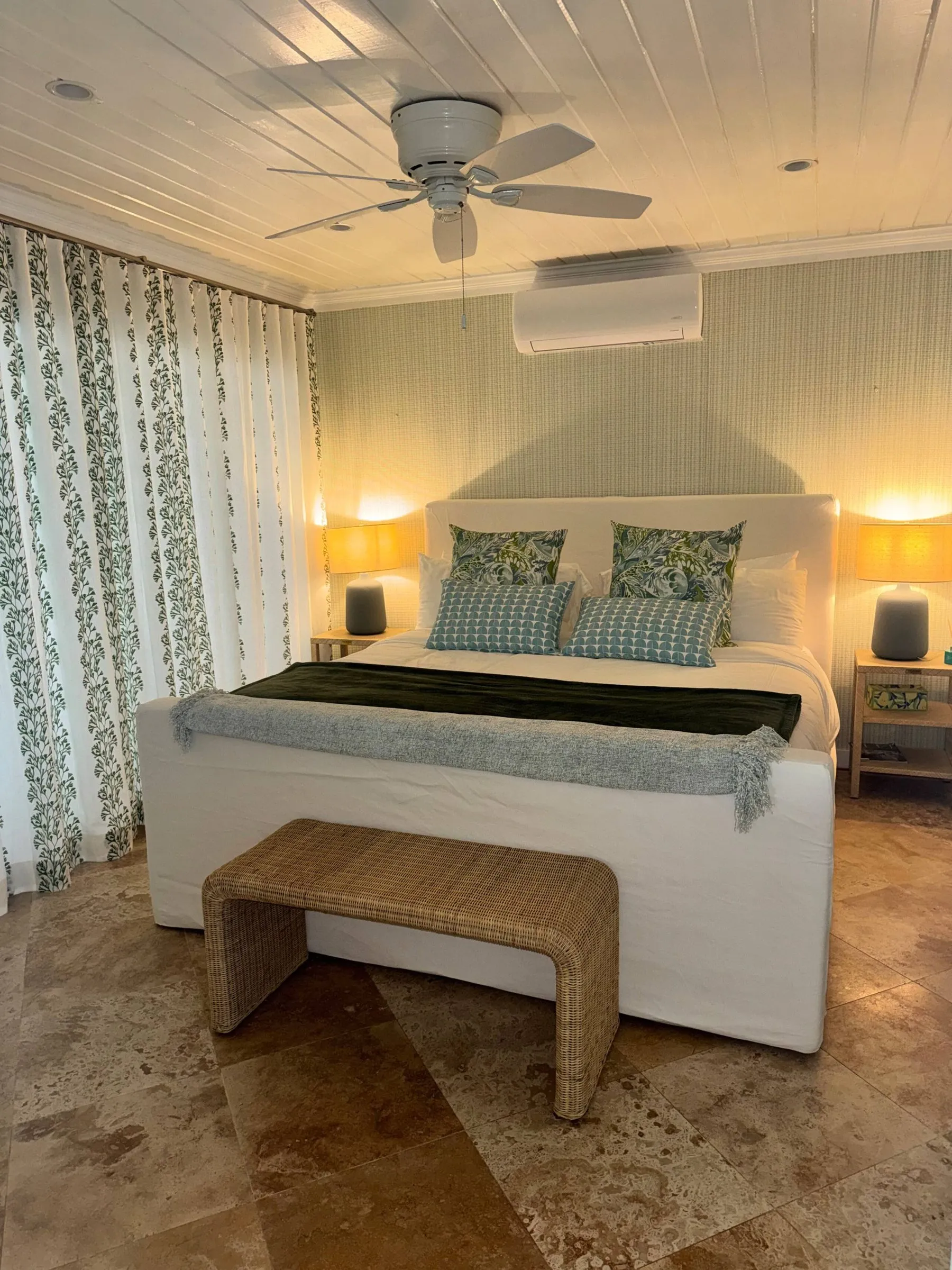 Second bedroom with green floral curtains