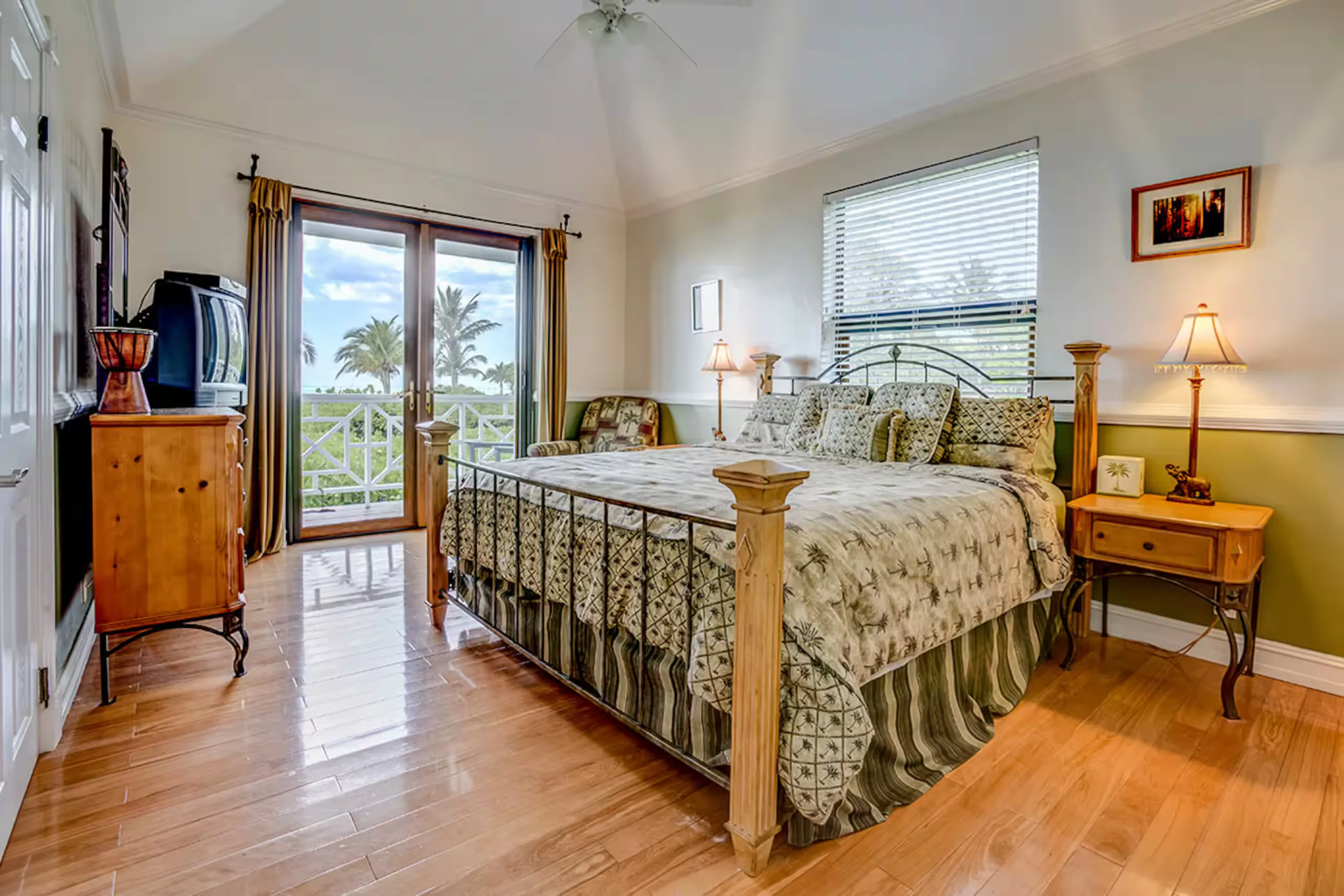 Dining room with a glimpse of the ocean through the deck doors
