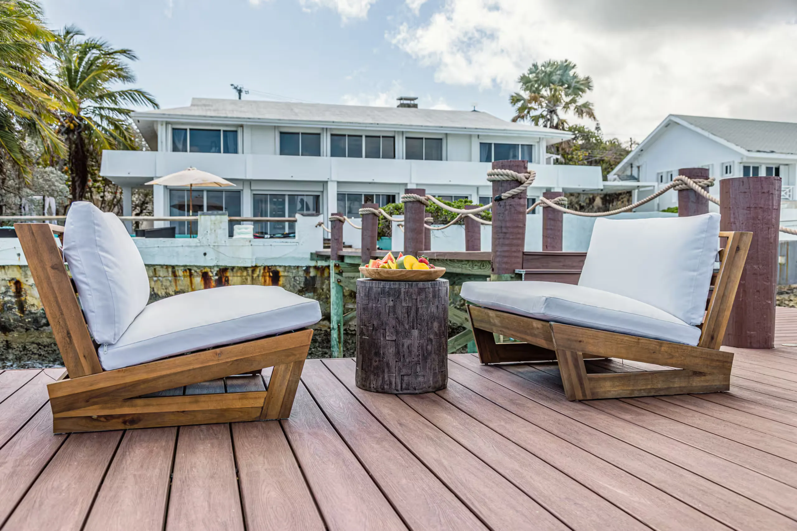 Outdoor lounge seating on the waterfront deck