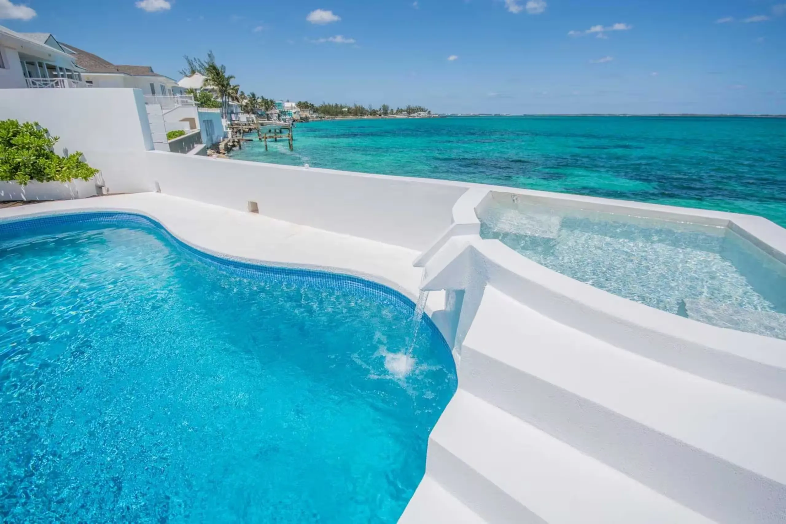 Infinity pool and hot tub overlooking the ocean