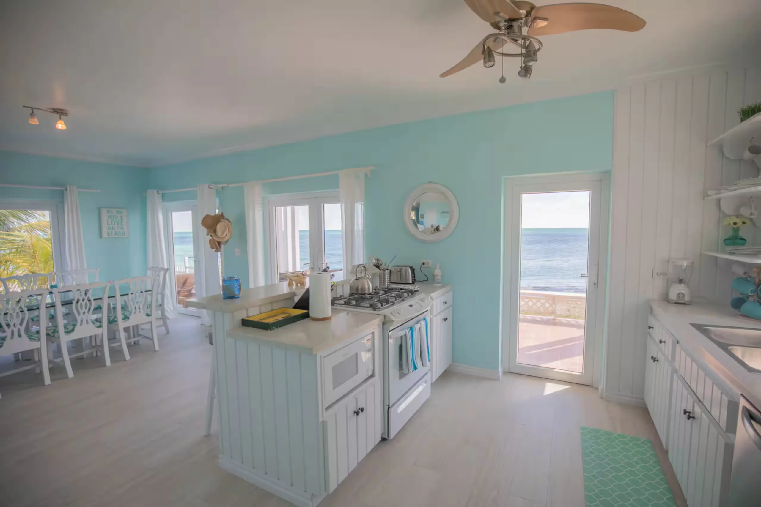 Kitchen with a direct ocean view through the patio door