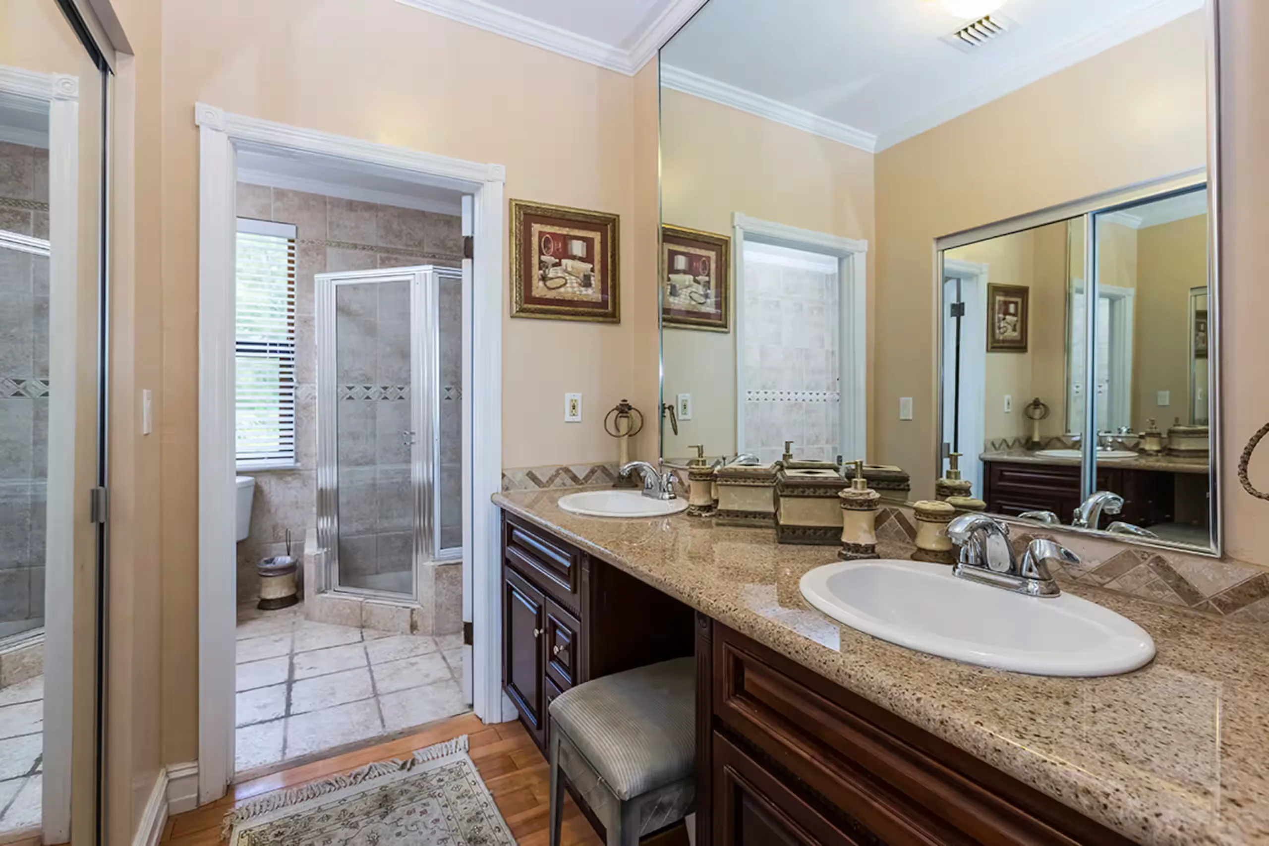 Kitchen with granite counters and wood cabinetry