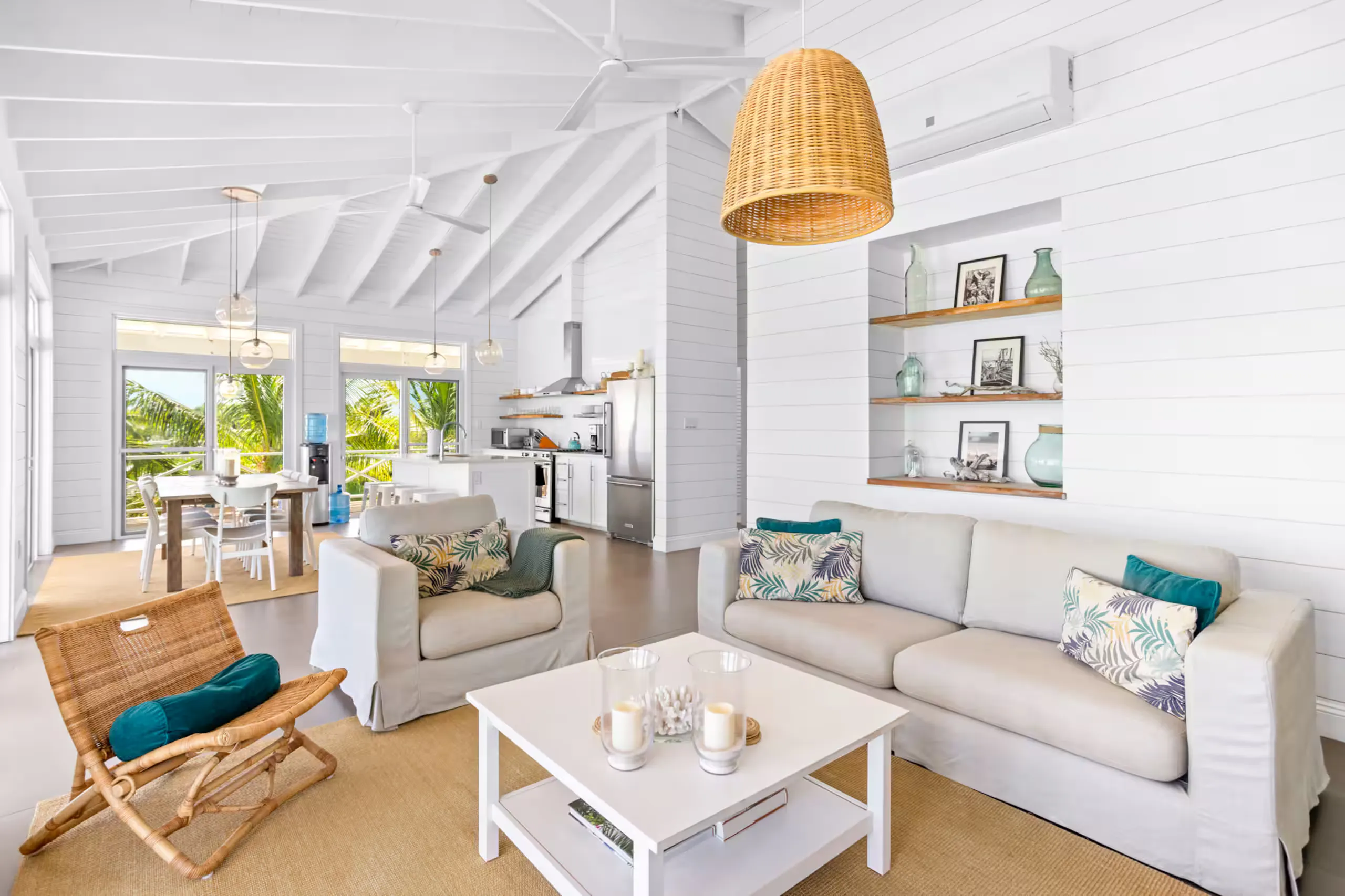 Living room with a woven rattan pendant light and built-in shelving
