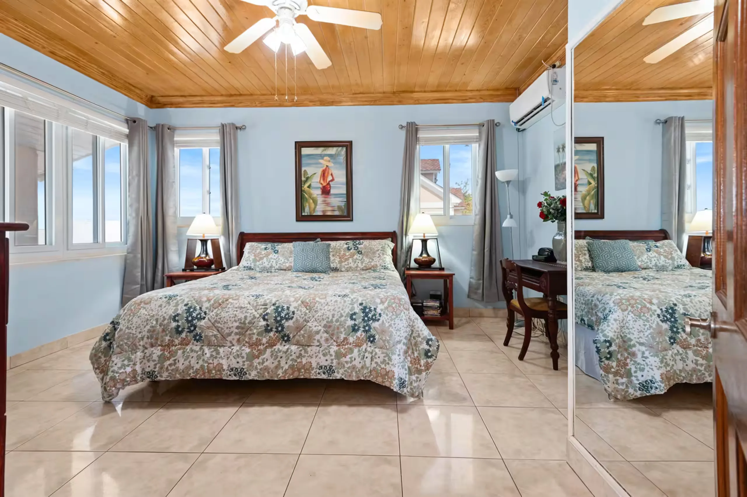 Primary bedroom with a king sleigh bed