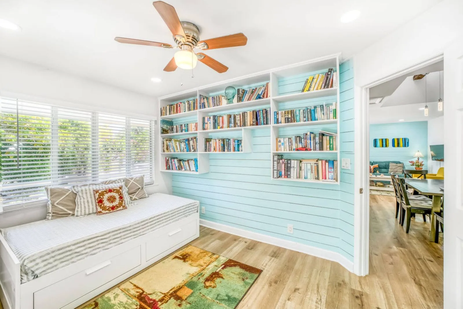 Reading nook with built-in bookshelves and a daybed