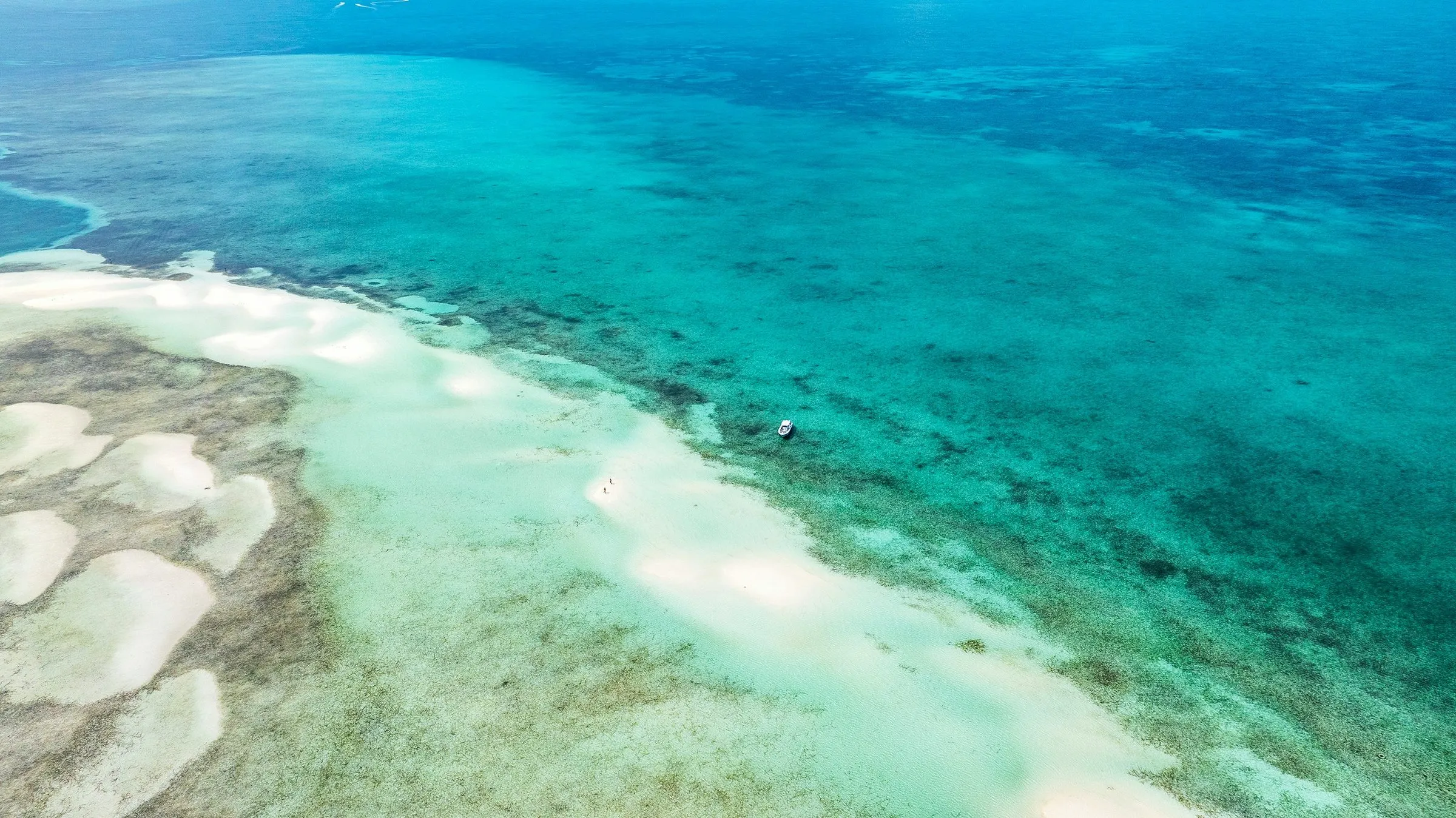 The sandbars and shallows between the two islands